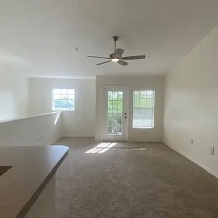 Rent this 2 bed apartment on 8991 Manor Loop in Manatee County, FL 34202