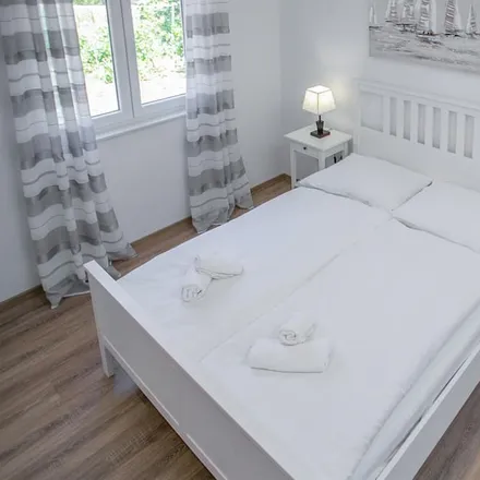 Rent this 4 bed house on 53291 Grad Novalja