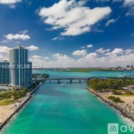 Rent this 2 bed apartment on 10295 Collins Ave