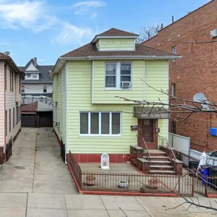 Buy this 4 bed house on 2261 81st Street in New York, NY 11214