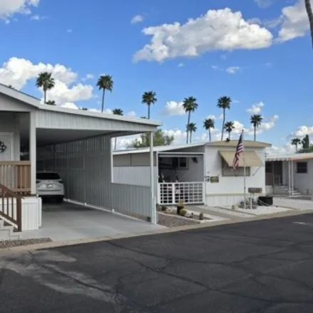 Buy this studio apartment on 10443 East Akron Street in Apache Junction, AZ 85120