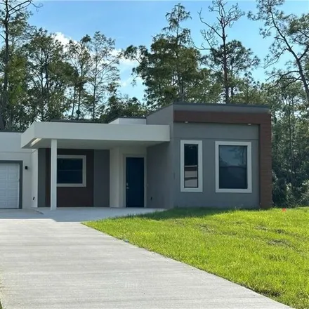 Buy this 3 bed house on 155 Greenbriar Boulevard in Lehigh Acres, FL 33972