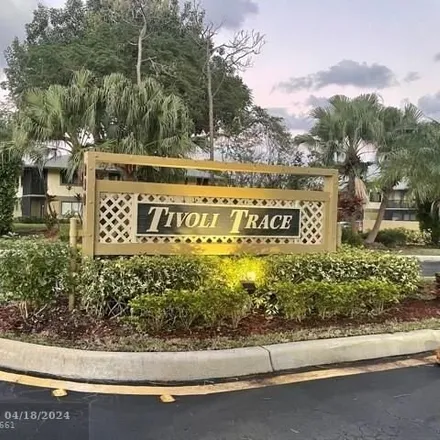 Rent this 2 bed condo on 529 Trace Circle in Arlington Park, Deerfield Beach