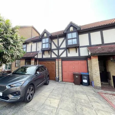 Buy this 4 bed townhouse on Mortlake Drive in London, CR4 3RQ