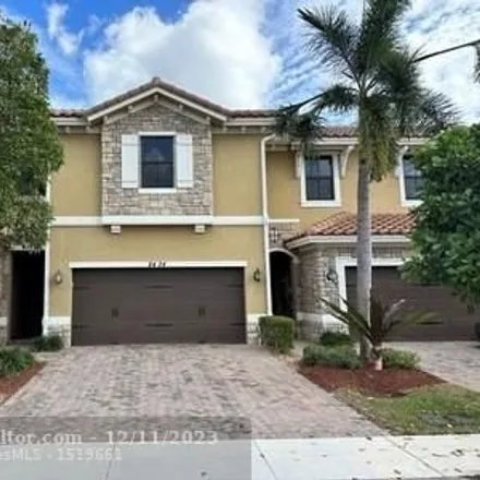 Buy this 4 bed townhouse on 8471 Blue Cove Way in Parkland, FL 33076