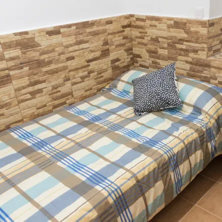 Rent this 4 bed room on Madrid in Granier, Calle de Viriato