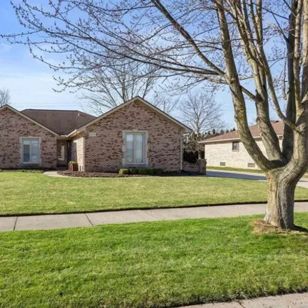 Buy this 3 bed house on 16550 Woodstream Drive in Clinton Township, MI 48038