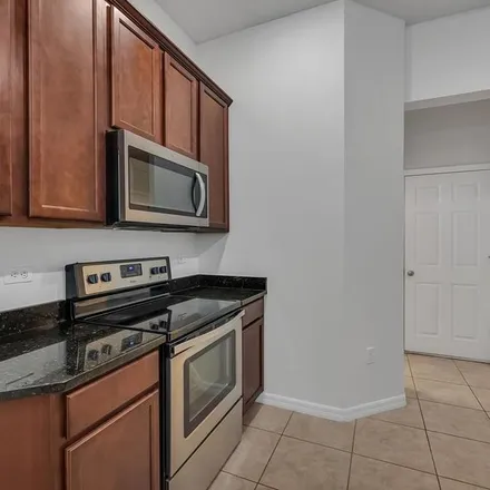 Rent this 4 bed apartment on 8284 Bryce Canyon Avenue in Lakeside Village, FL 34786