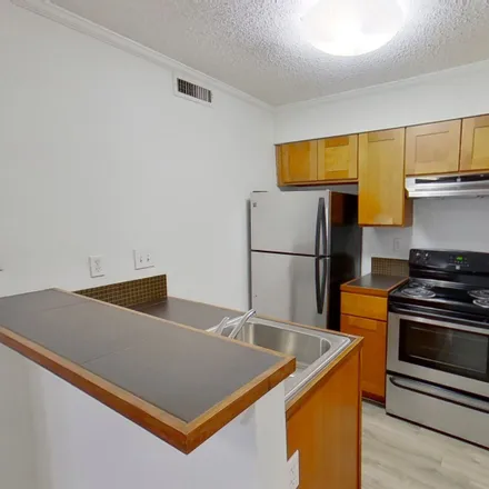 Rent this 2 bed apartment on 1521 Palma Plaza in Austin, TX 78703