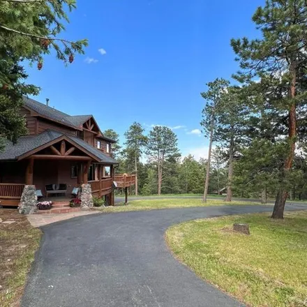 Buy this 5 bed house on 24987 Giant Gulch Rd in Evergreen, Colorado