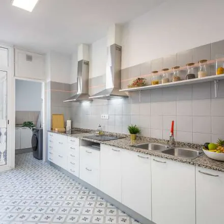 Rent this 8 bed apartment on Clínica Baviera in Gran Via del Marqués del Túria, 9