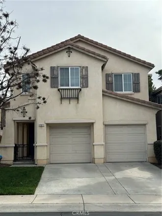 Rent this 4 bed house on 12874 Dolomite Lane in Moreno Valley, CA 92555