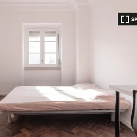 Rent this 7 bed room on Rua José Estevão 29 in 1150-200 Lisbon, Portugal