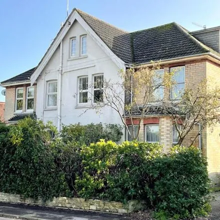 Buy this 4 bed townhouse on Bingham Avenue in Lilliput Road, Bournemouth