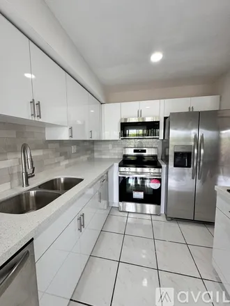 Rent this 2 bed apartment on 5900 SW 127th Ave