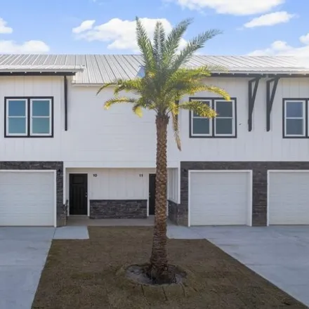 Rent this 3 bed house on 7120 Patronis Drive in Upper Grand Lagoon, FL 32408