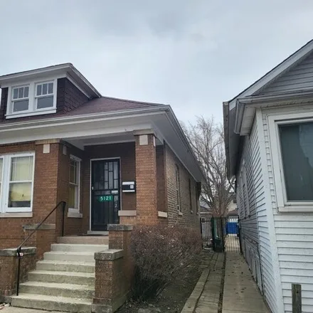 Buy this 3 bed house on 5121 West School Street in Chicago, IL 60634