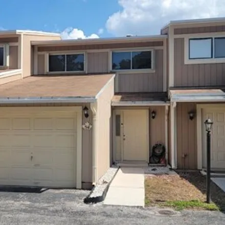 Buy this 3 bed townhouse on 54 Maplecrest Cir in Jupiter, Florida