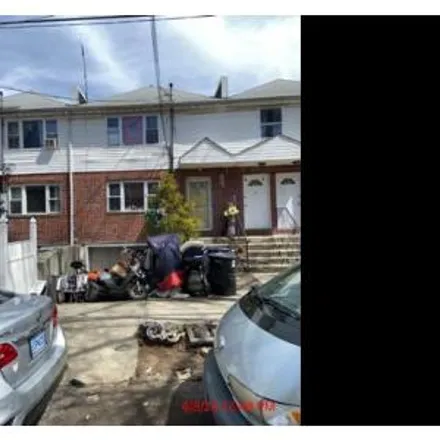 Buy this 3 bed house on 109-01 109th Avenue in New York, NY 11433