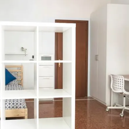 Rent this 4 bed room on Via privata Piero Martinetti in 20148 Milan MI, Italy