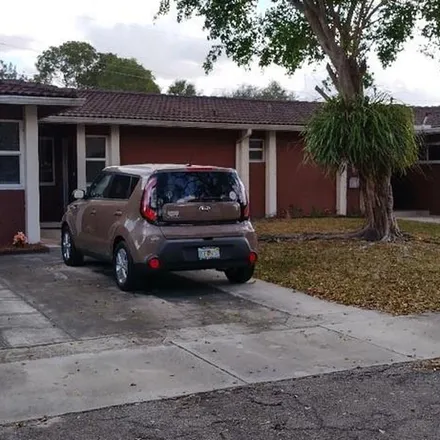 Rent this 2 bed apartment on 13920 Lake Placid Court in Miami Lakes, FL 33014