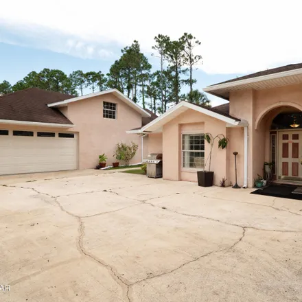 Buy this 3 bed house on 56 Emerson Drive in Palm Coast, FL 32164