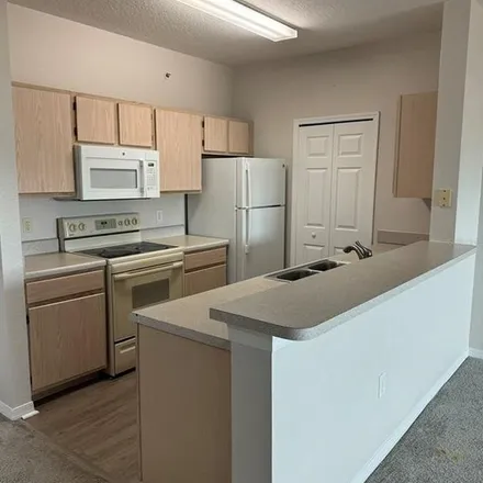 Rent this 2 bed apartment on 5533 Vineland Road in Orlando, FL 32811