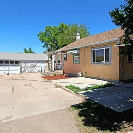 Buy this 2 bed house on 1521 Poplar Avenue in Prospect Heights, Fremont County