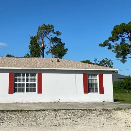 Rent this 2 bed duplex on 5007 Leonard Boulevard South in Lehigh Acres, FL 33973