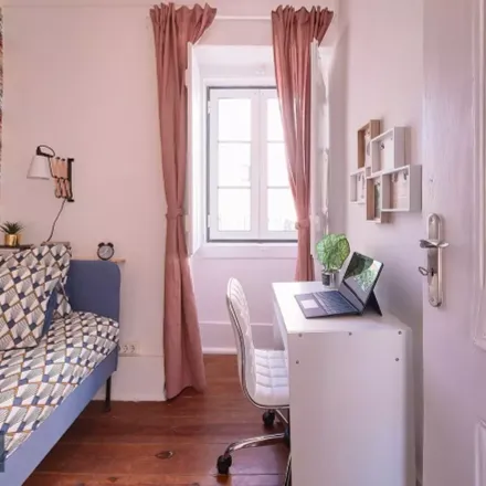 Rent this studio room on Largo de Domingos Tendeiro in 1400-077 Lisbon, Portugal