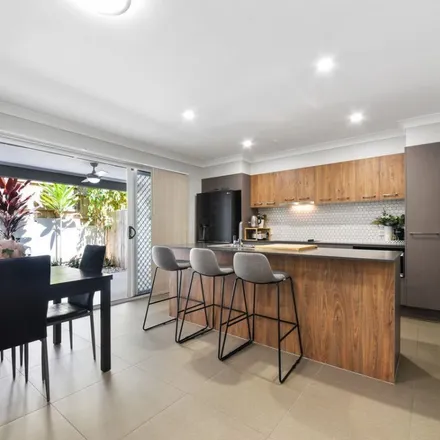 Rent this 4 bed apartment on 23 Raroka Street in Carseldine QLD 4034, Australia