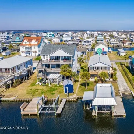 Buy this 4 bed house on 4th Street in Surf City, NC 28445