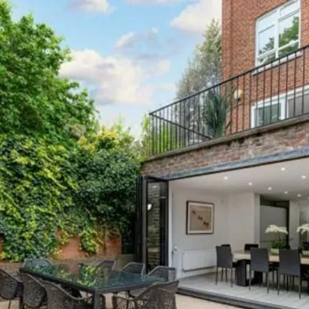Rent this 4 bed townhouse on 5 Harley Road in London, NW3 3BX