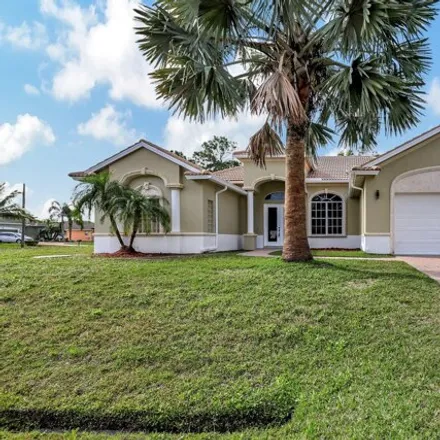 Buy this 4 bed house on 6468 Northwest Regal Circle in Port Saint Lucie, FL 34983