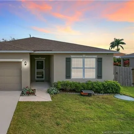 Buy this 4 bed house on 4337 Southwest Appleseed Road in Port Saint Lucie, FL 34953