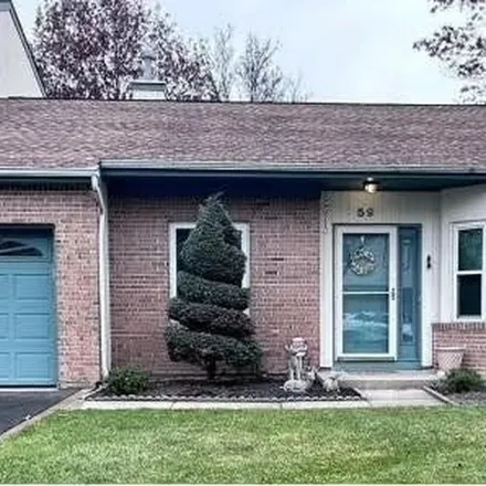 Rent this 2 bed apartment on 59 Timber Ridge Drive in Brookhaven, Holtsville