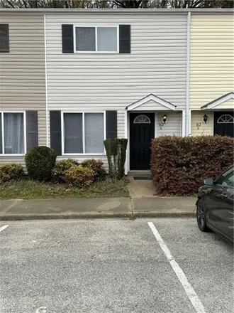 Rent this 2 bed townhouse on 162 Delmar Ln Apt G in Newport News, Virginia