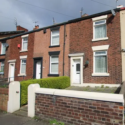 Rent this 2 bed townhouse on Spring Lane in Blackburn, BB2 2TE