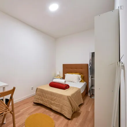 Rent this 6 bed room on Rua Carvalho Araújo 75 in 1900-140 Lisbon, Portugal
