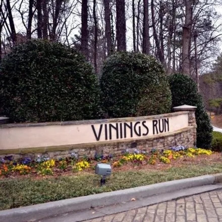 Buy this 2 bed condo on Cumberland Court in Vinings, GA 30339