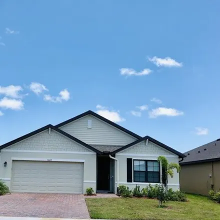 Rent this 4 bed house on Foggy Mist Road Southeast in Palm Bay, FL