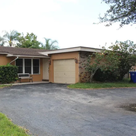 Rent this 4 bed house on 700 North Douglas Road in Pembroke Pines, FL 33024