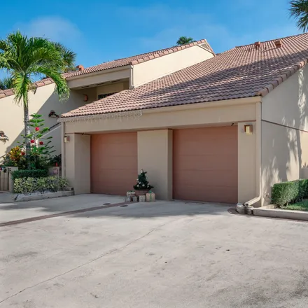 Buy this 2 bed townhouse on 104 Waterview Drive in Palm Beach Gardens, FL 33418