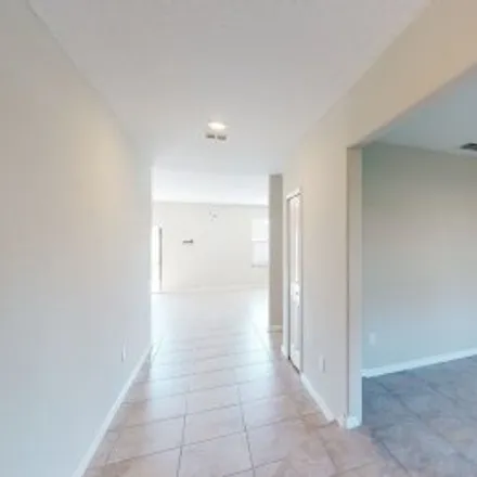 Buy this 4 bed apartment on 4205 Globe Thistle Drive in Greater Palm River Point, Tampa