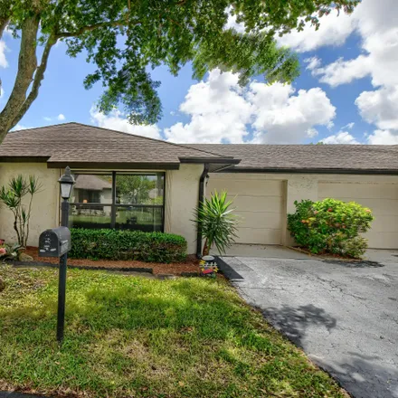 Buy this 2 bed townhouse on 10121 Eaglewood Terrace in Country Club Trail, Palm Beach County