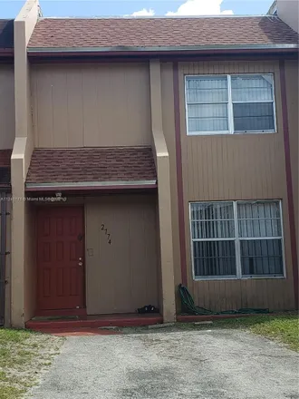 Buy this 3 bed townhouse on U-Haul in Northwest 27th Avenue, Carol City