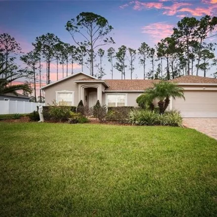 Buy this 3 bed house on 66 Woodfield Drive in Palm Coast, FL 32164