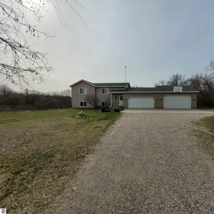Buy this 4 bed house on 9594 Montcalm Road Northeast in Eureka Township, MI 48838