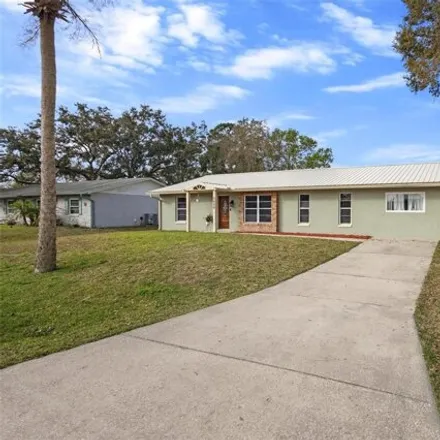 Buy this 3 bed house on 3408 Unity Tree Drive in Edgewater, FL 32141