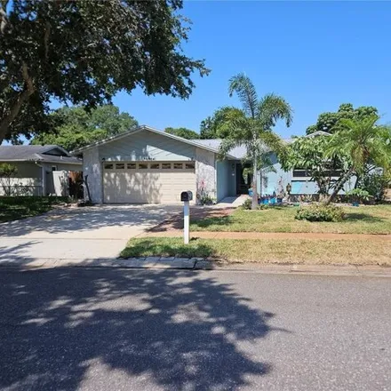 Buy this 3 bed house on 12942 98th Street North in Ulmerton, Pinellas County
